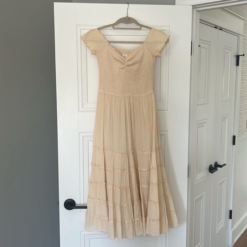 Cream colored tiered dress from Revolve